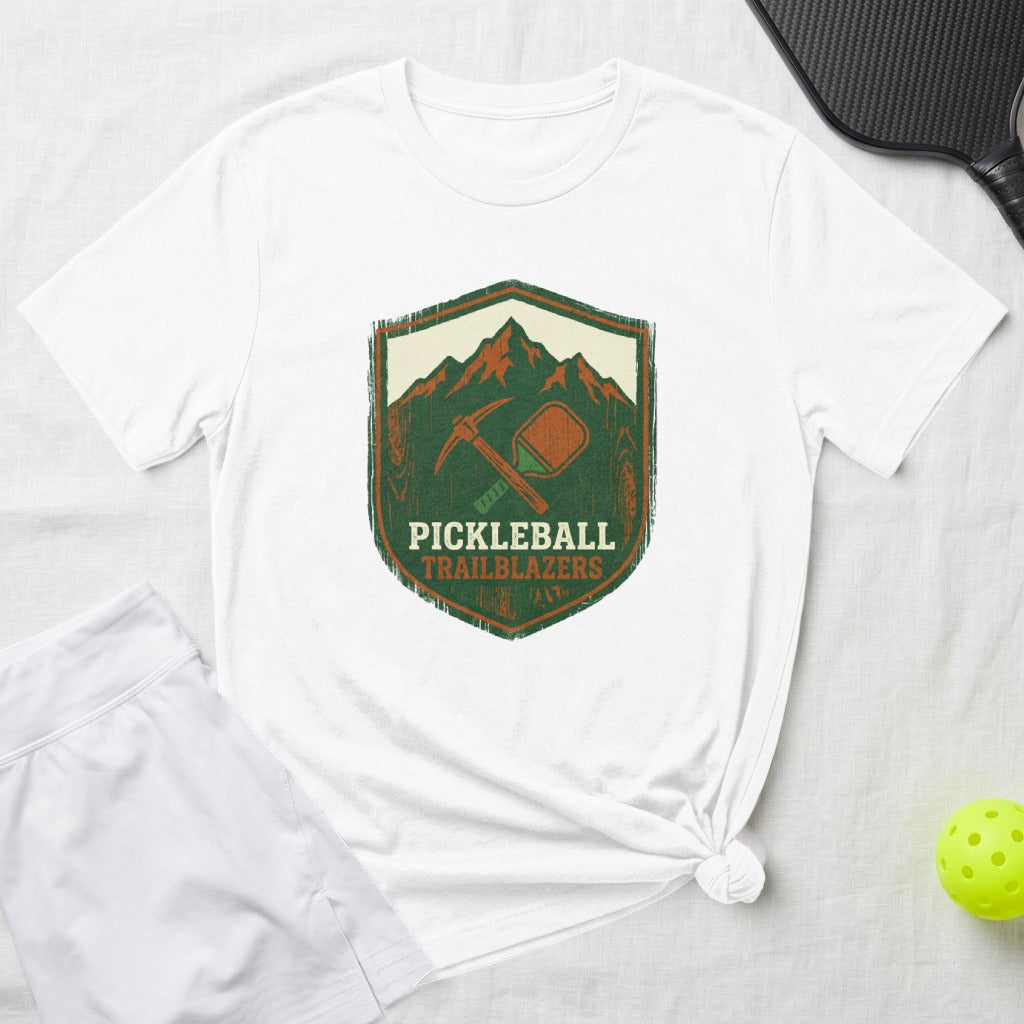 White t-shirt with "Pickleball Trailblazers" shield logo featuring crossed paddles and pickaxe.