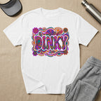 White t-shirt with "DINKY" in a psychedelic, colorful, floral font.