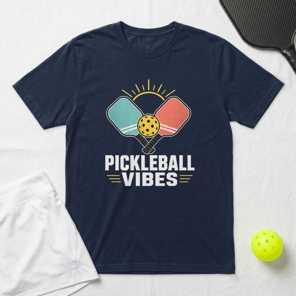 Navy t-shirt with "Pickleball Vibes" text and graphic of paddles and ball.