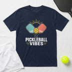 Navy t-shirt with "Pickleball Vibes" text and graphic of paddles and ball.