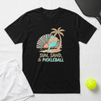 T-shirt with "Sun, Sand, & Pickleball" text and sunset beach graphic.
