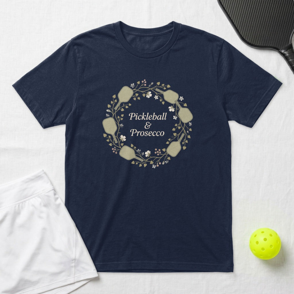 Navy t-shirt with wreath graphic: Pickleball & Prosecco.