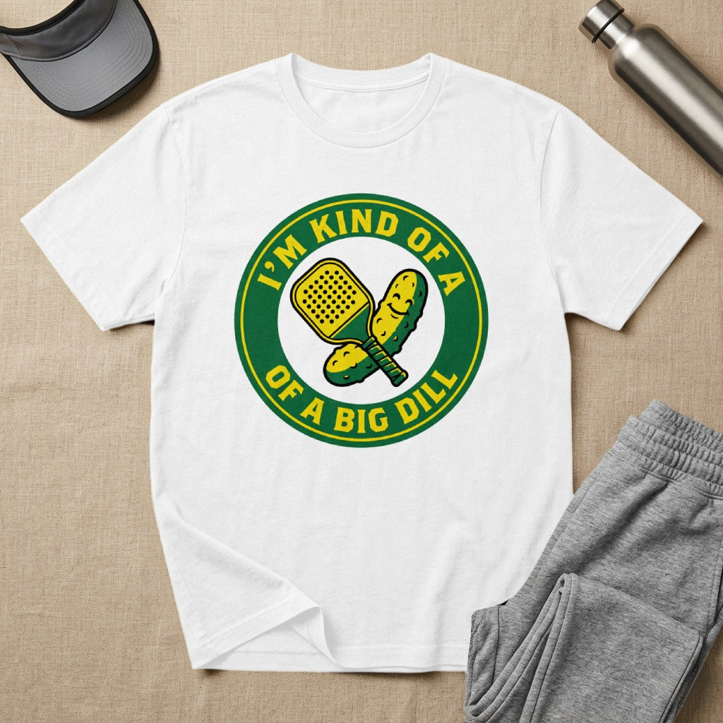 White t-shirt with green circle logo featuring pickle and paddle, "I'm kind of a big dill" text.