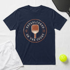 Navy t-shirt with circular "Established on the Court" pickleball graphic.