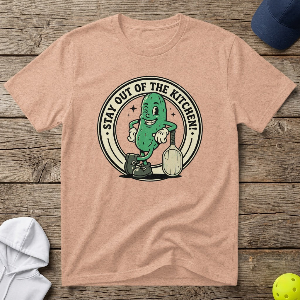 Pickleball player pickle character saying "Stay Out Of The Kitchen!" on t-shirt.