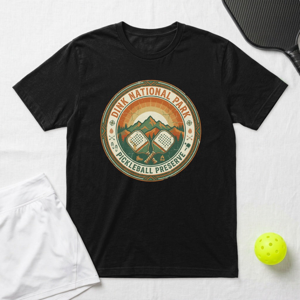 Black t-shirt with "Dink National Park Pickleball Preserve" circular graphic.