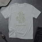 Gray t-shirt with a minimalist pickleball graphic and "grown on the court" text.
