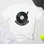White t-shirt with a vinyl record and pickleball graphic, text reads "The Sound of the Dink".