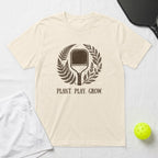 T-shirt with pickleball paddle design and "PLANT. PLAY. GROW." text.