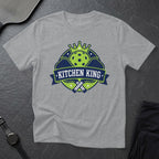 Grey t-shirt with "Kitchen King" logo featuring a crown and pickleball paddles.