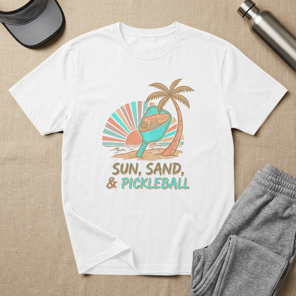 White t-shirt with "Sun, Sand, & Pickleball" text and beach graphic.