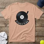 Peach t-shirt with a vinyl record and pickleball graphic, reads "The Sound of the Dink".