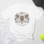 White t-shirt with embroidered floral and bird design, "Court & Garden" text.