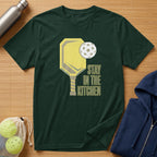 Dark green t-shirt with yellow pickleball paddle, ball, and text.