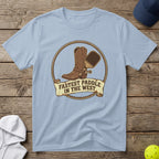Light blue t-shirt with cowboy boot, paddle, and "Fastest Paddle in the West" text.