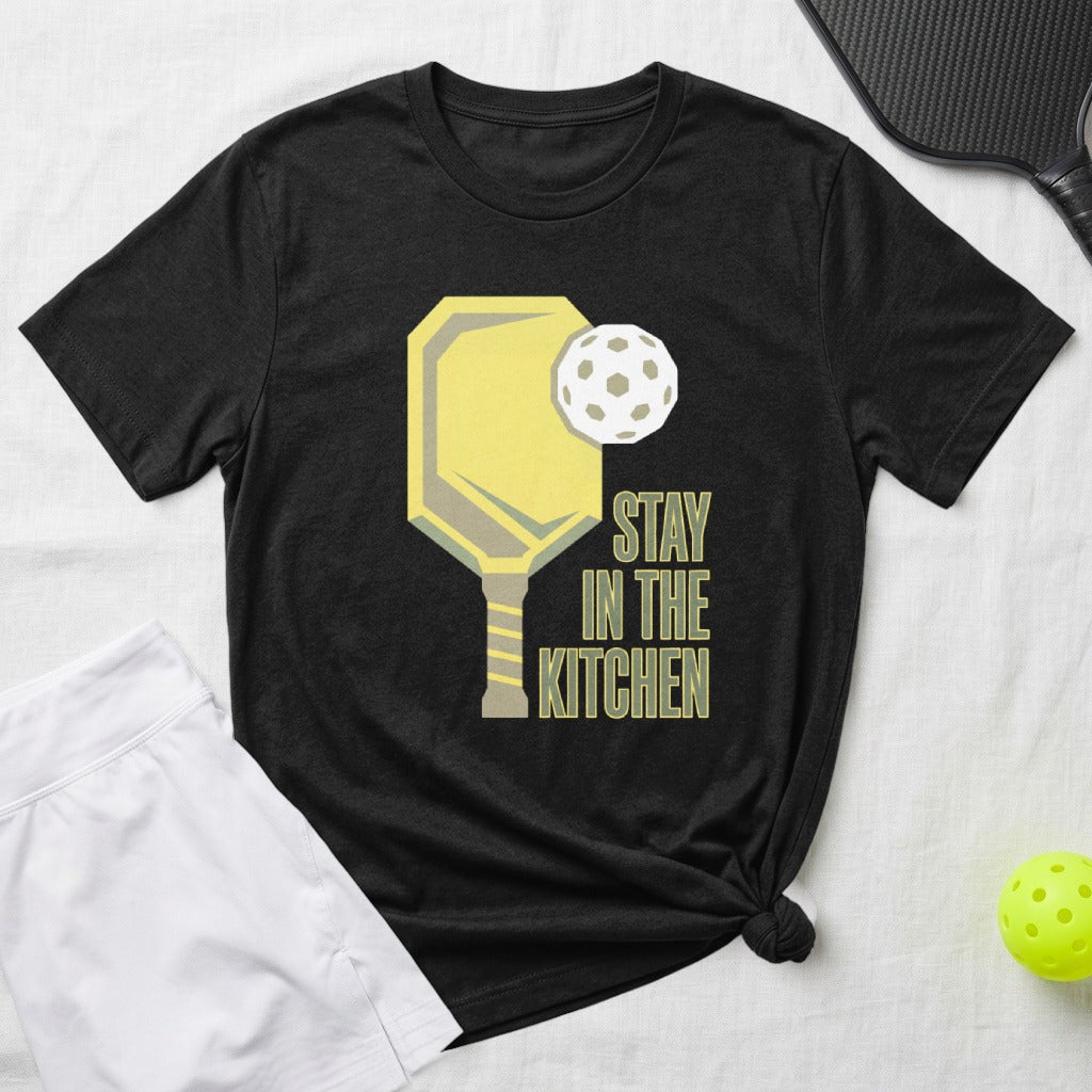 Black t-shirt with yellow pickleball paddle, ball, and "Stay in the Kitchen" text.