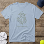 Light blue t-shirt with a line drawing of a pickleball plant.