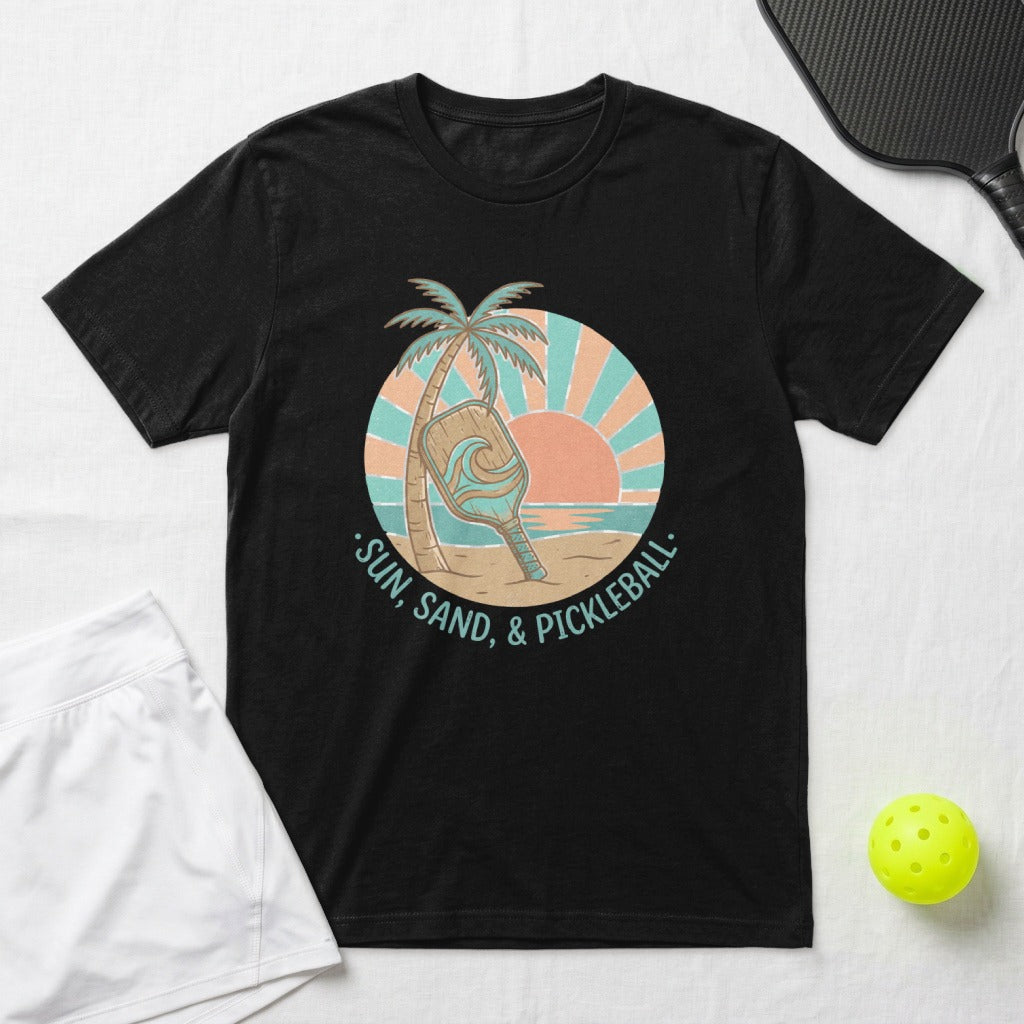 Black t-shirt with "Sun, Sand, & Pickleball" graphic featuring a paddle and palm tree.