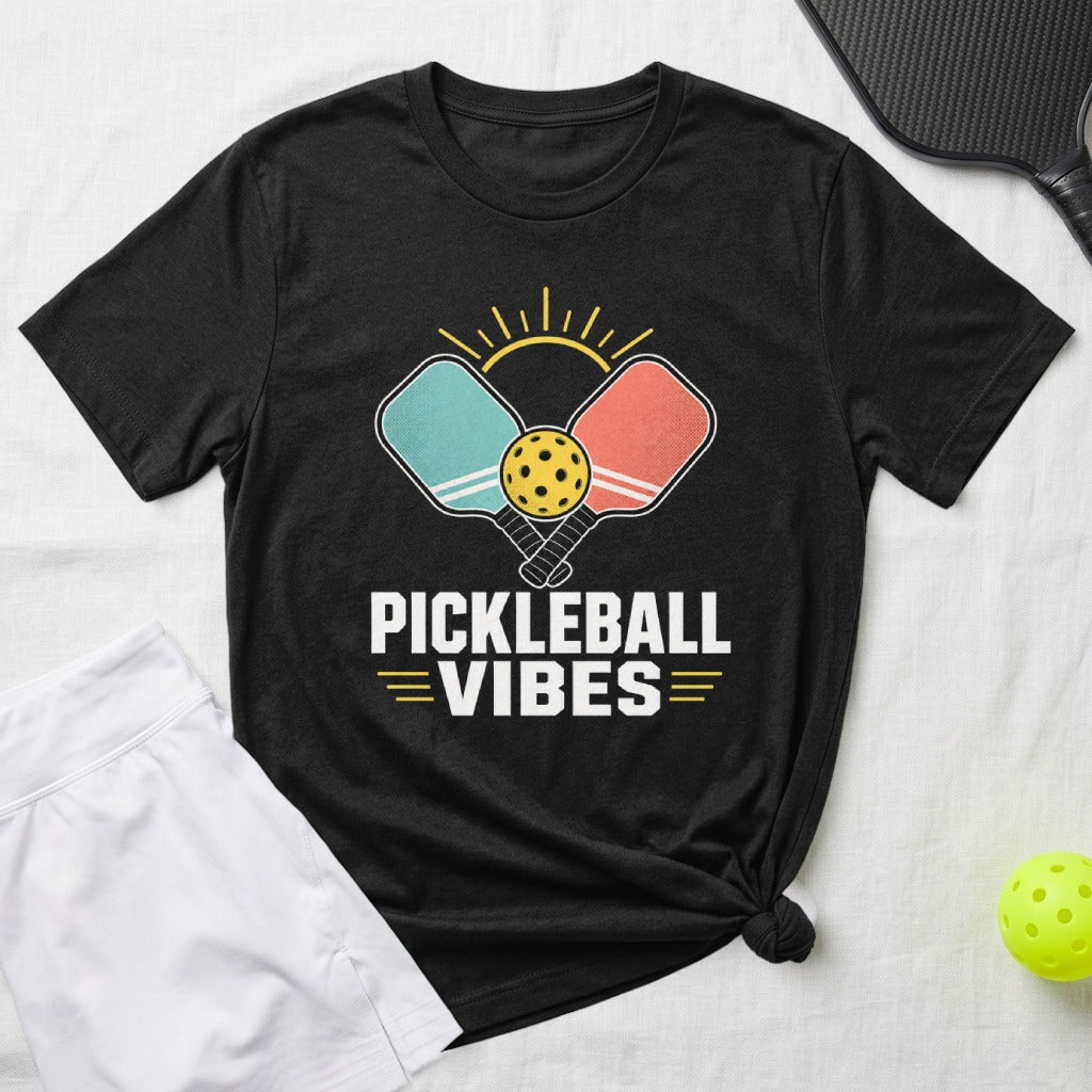 Black t-shirt with pickleball paddles, ball, and text "PICKLEBALL VIBES".