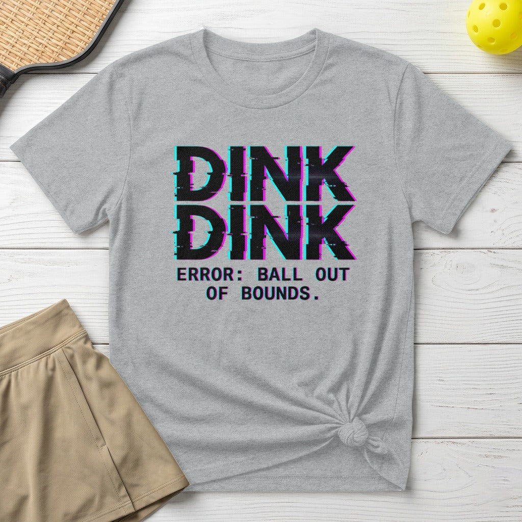 Grey t-shirt with "DINK DINK ERROR: BALL OUT OF BOUNDS" text, light brown skirt.