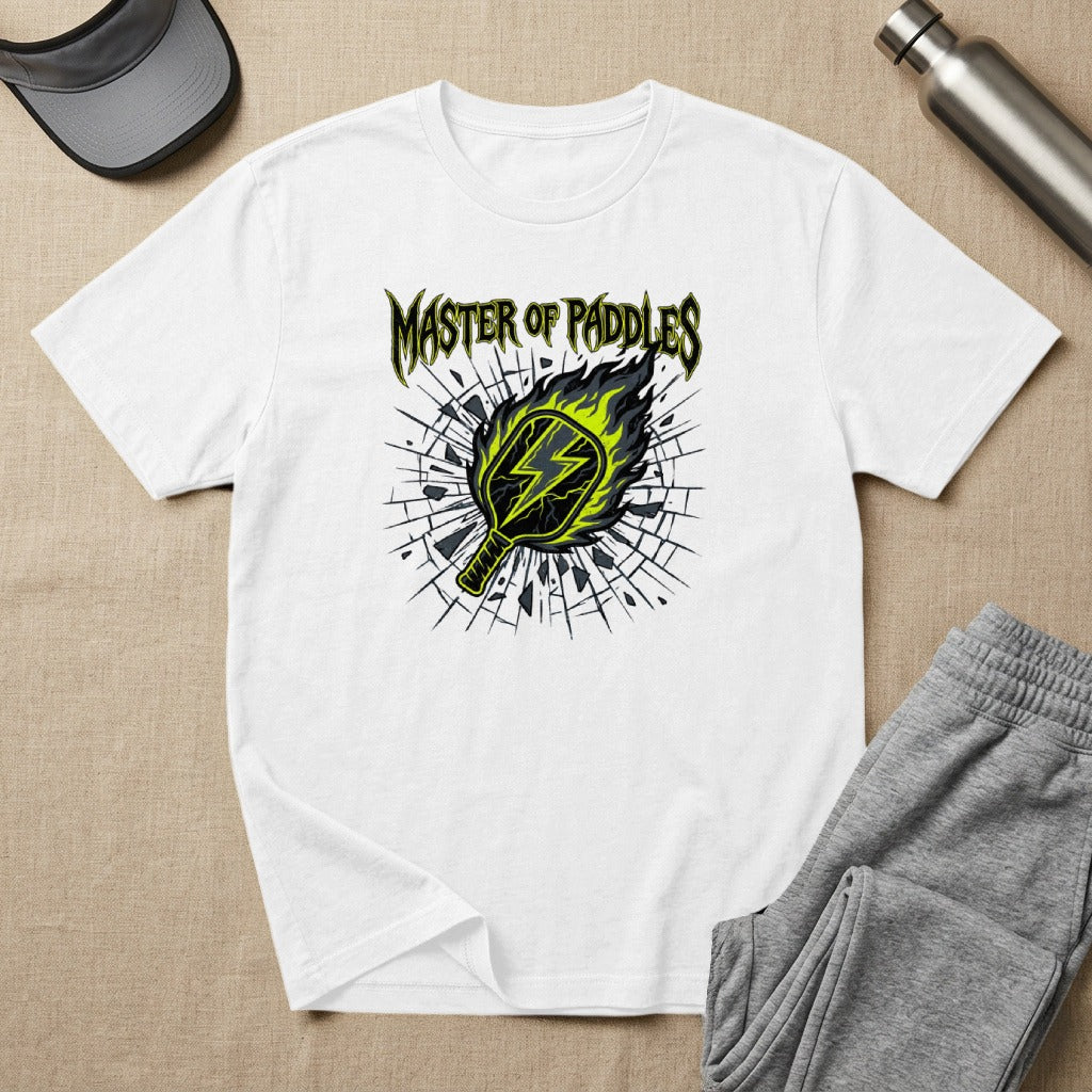 White t-shirt with a pickleball paddle breaking through a cracked surface.