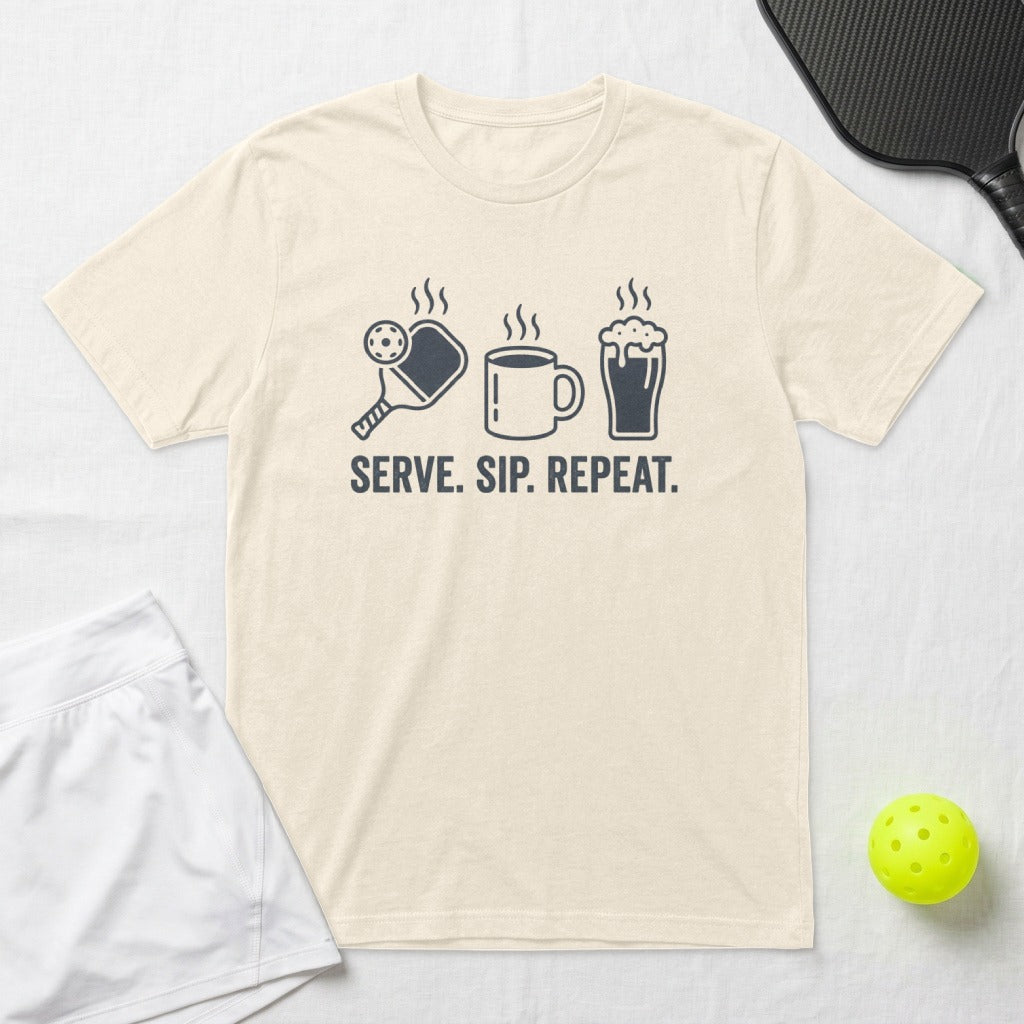 T-shirt with pickleball paddle, ball, coffee cup, and text "SERVE. SIP. REPEAT."