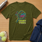 Olive t-shirt with neon pickleball racket and "COURT VIBES" text.