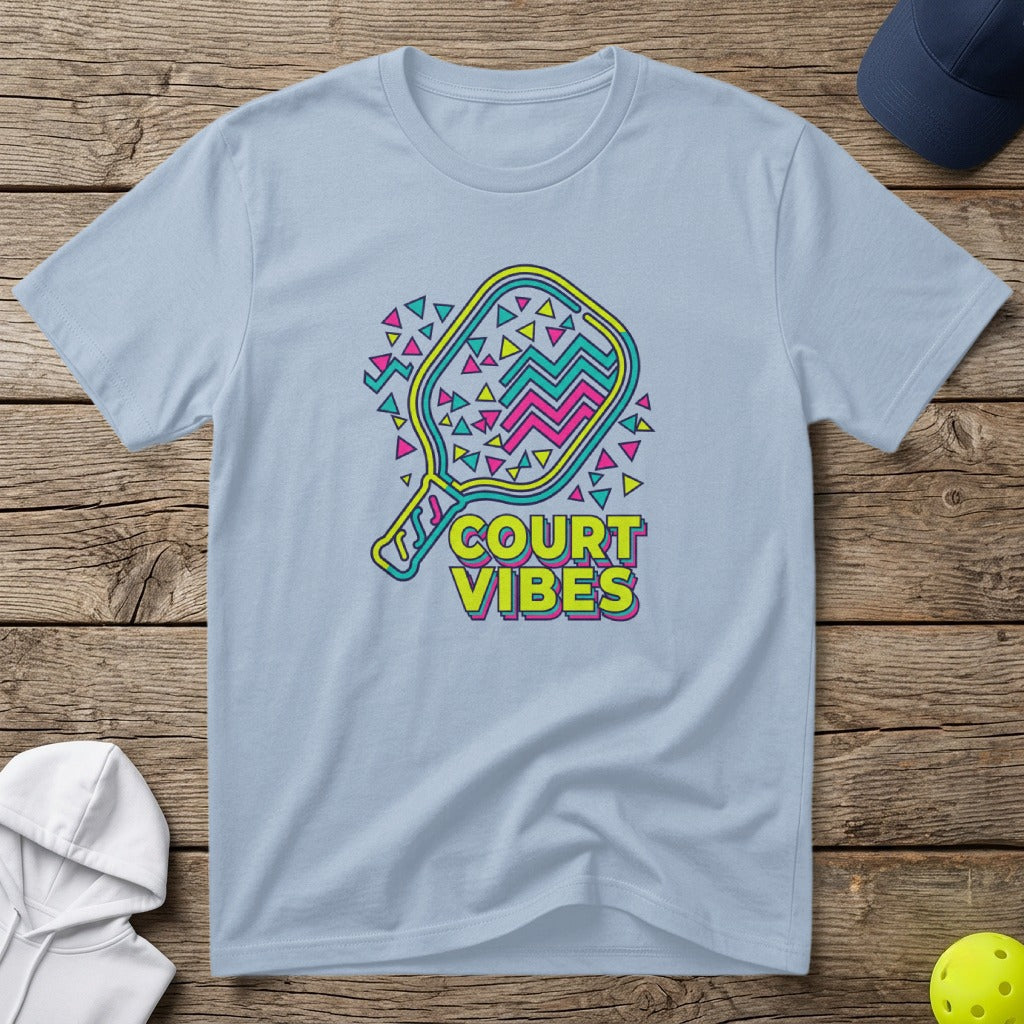 Light blue t-shirt with "COURT VIBES" and a pickleball paddle graphic.
