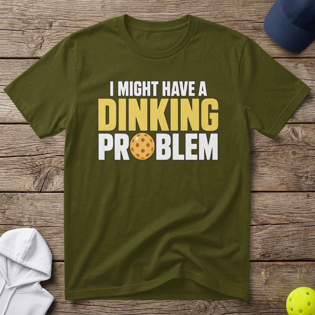 Olive t-shirt with "I MIGHT HAVE A DINKING PROBLEM" and pickleball graphic.