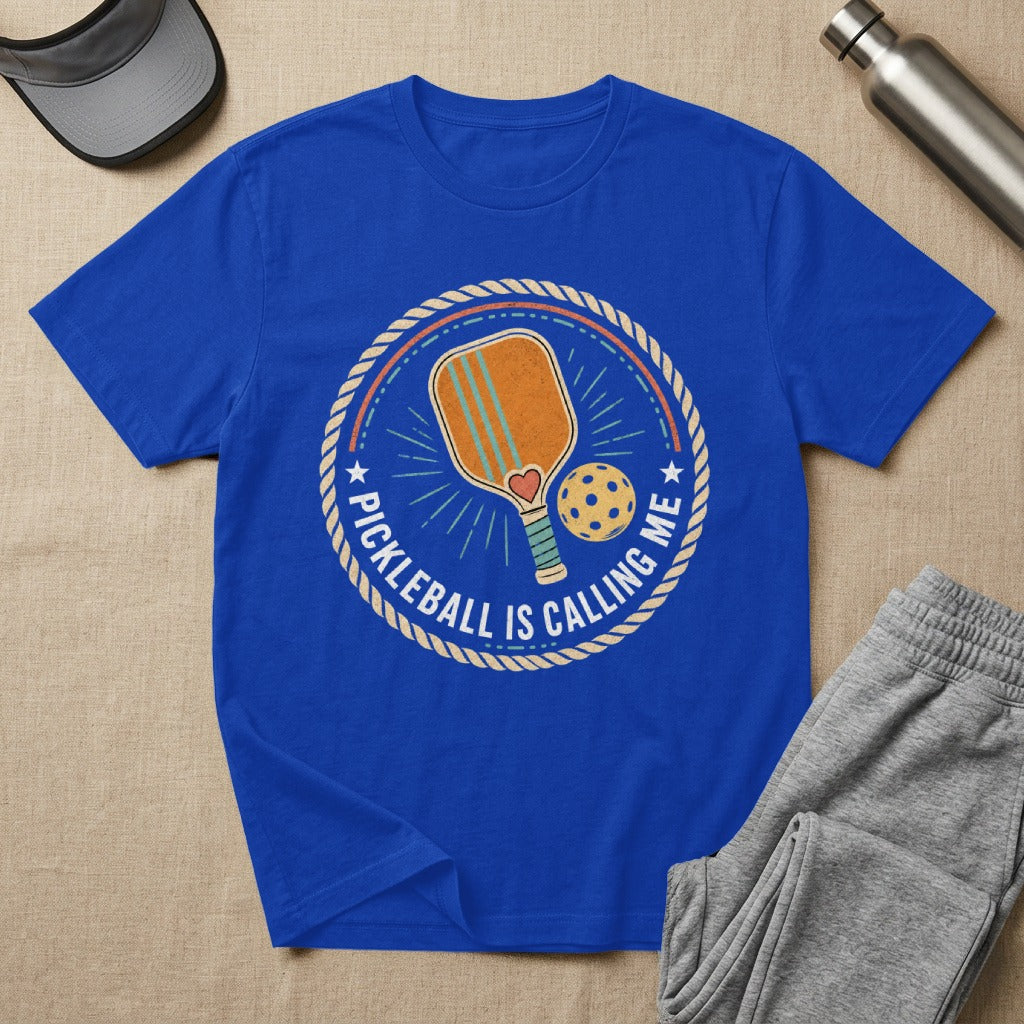 Royal blue t-shirt with pickleball graphic and "Pickleball is calling me" text.