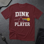 Maroon t-shirt with "DINK PLAYER" and a prism with a pickleball in place of a rainbow.