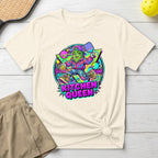 Pickleball queen graphic on a cream t-shirt with a tennis skirt.