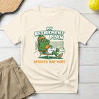 T-shirt with cartoon pickle relaxing on lounge chair, text "My Retirement Plan Results May Vary".