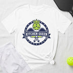 White t-shirt with "Kitchen Queen" logo and crossed pickleball paddles.