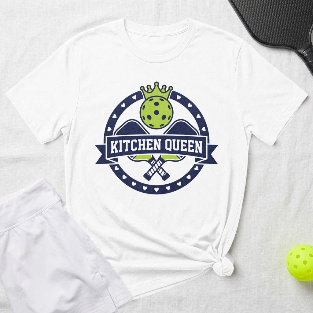 White t-shirt with "Kitchen Queen" logo and crossed pickleball paddles.