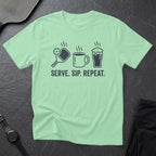 T-shirt with pickleball, coffee, and beer icons and "Serve. Sip. Repeat." text.