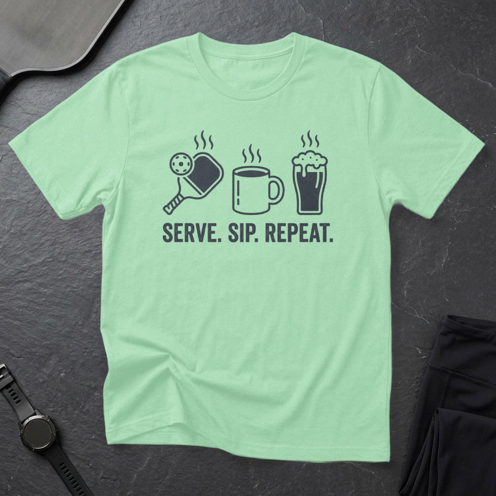 T-shirt with pickleball, coffee, and beer icons and "Serve. Sip. Repeat." text.