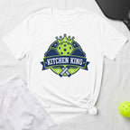 White t-shirt with "Kitchen King" logo featuring pickleball paddles and crown.