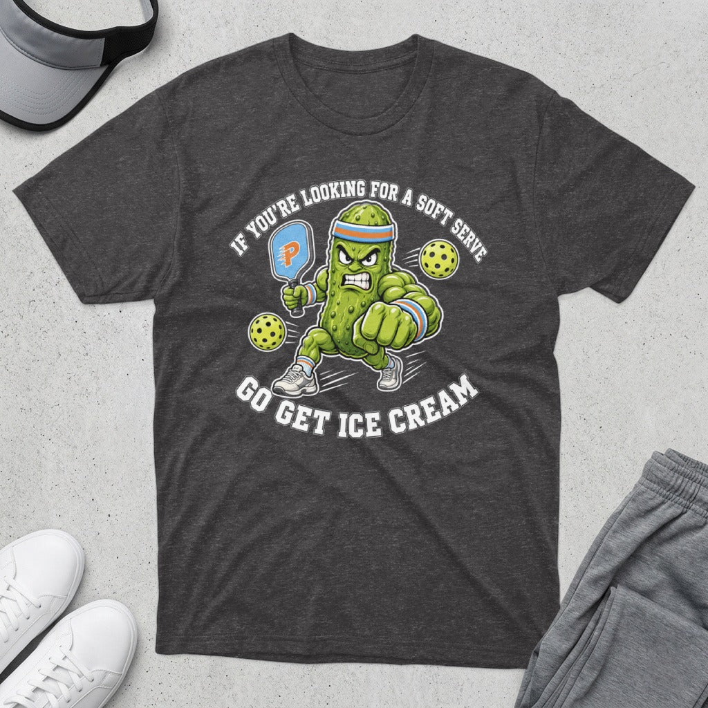T-shirt with pickleball player pickle holding paddle, "If you're looking for a soft serve, go get ice cream."