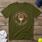 Green t-shirt with "Established on the Court" and pickleball paddle graphic.
