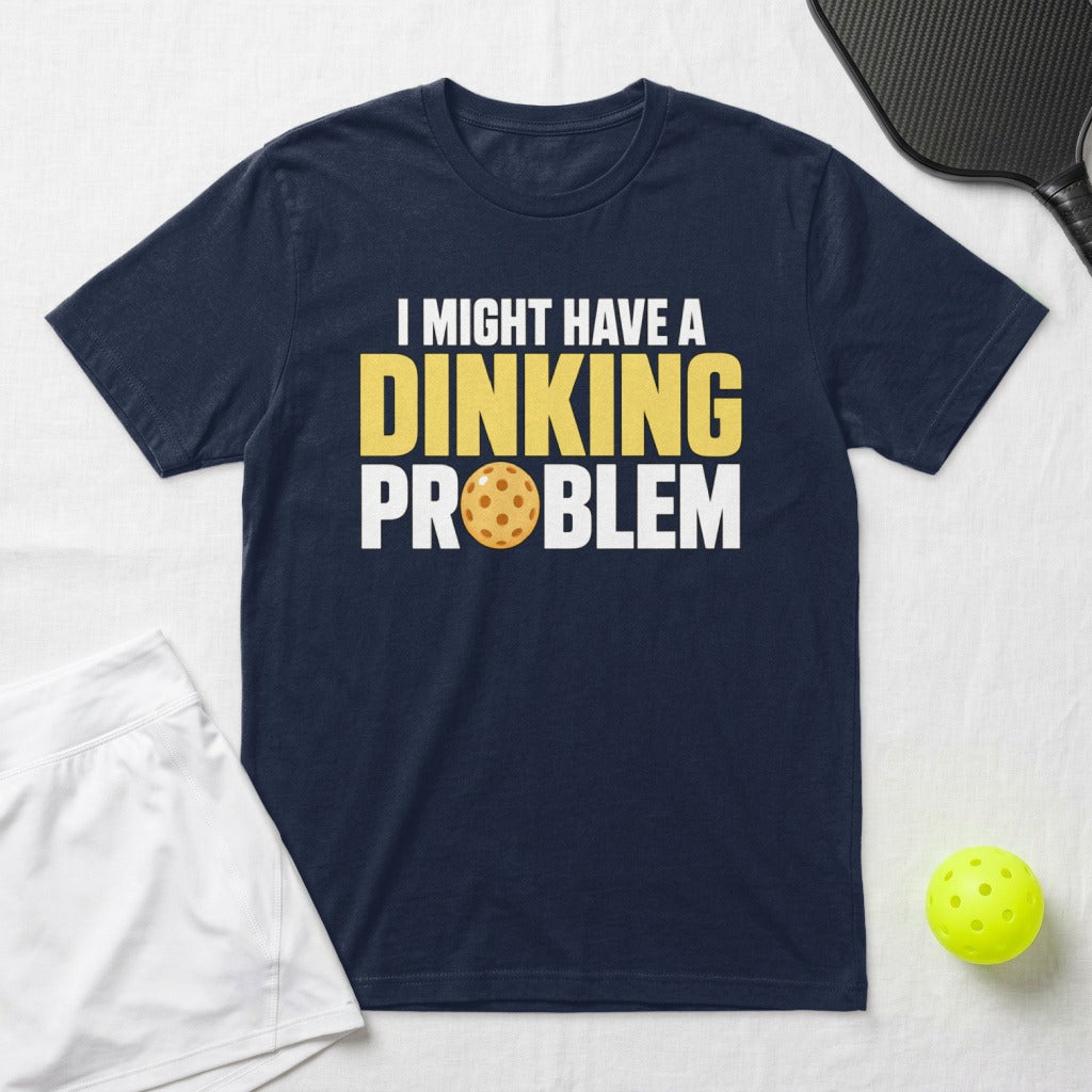 Navy t-shirt with "I MIGHT HAVE A DINKING PROBLEM" and pickleball graphic.