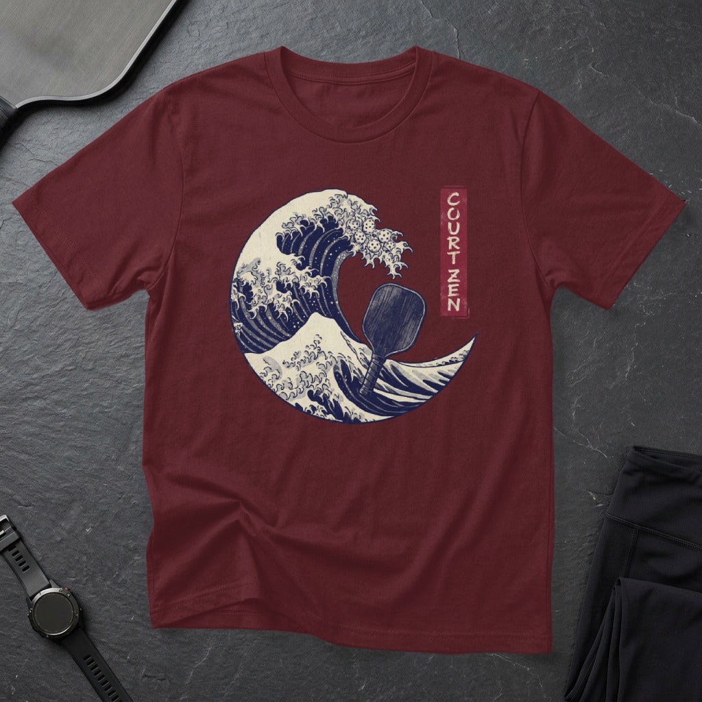 Maroon t-shirt with a stylized wave and paddle, featuring "COURT ZEN" text.