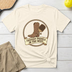 Cowboy boot and pickleball paddle on a cream t-shirt with text "Fastest Paddle In The West".