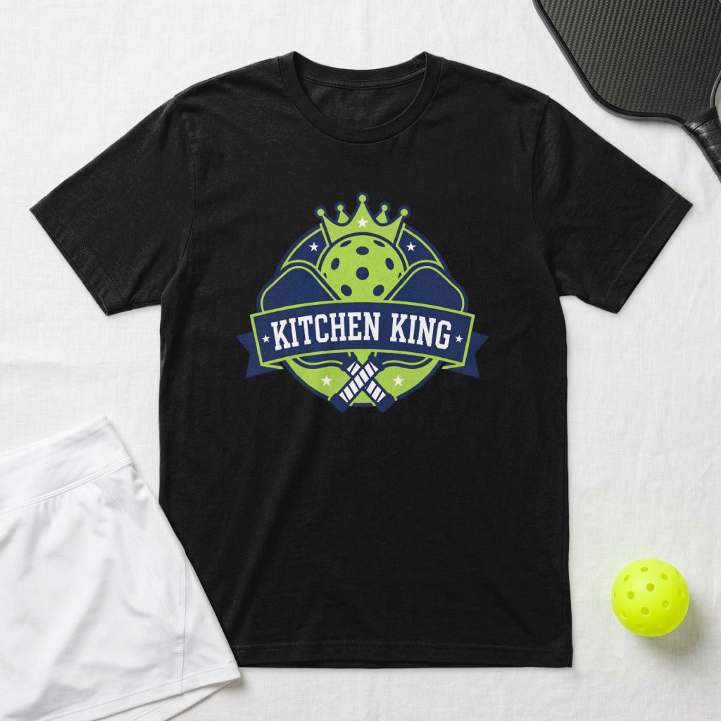 Black t-shirt with "Kitchen King" logo featuring crossed pickleball paddles and crown.
