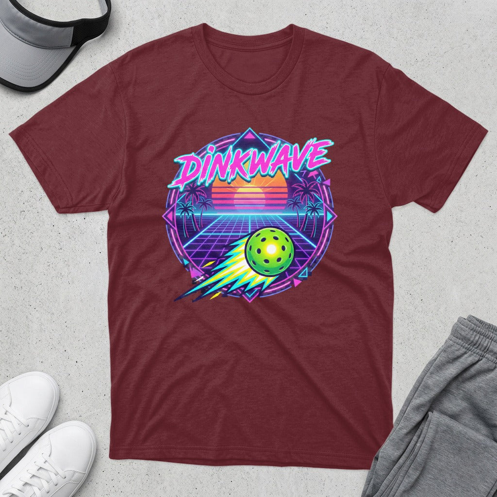 Maroon t-shirt with "DINKWAVE" text and neon pickleball graphic.