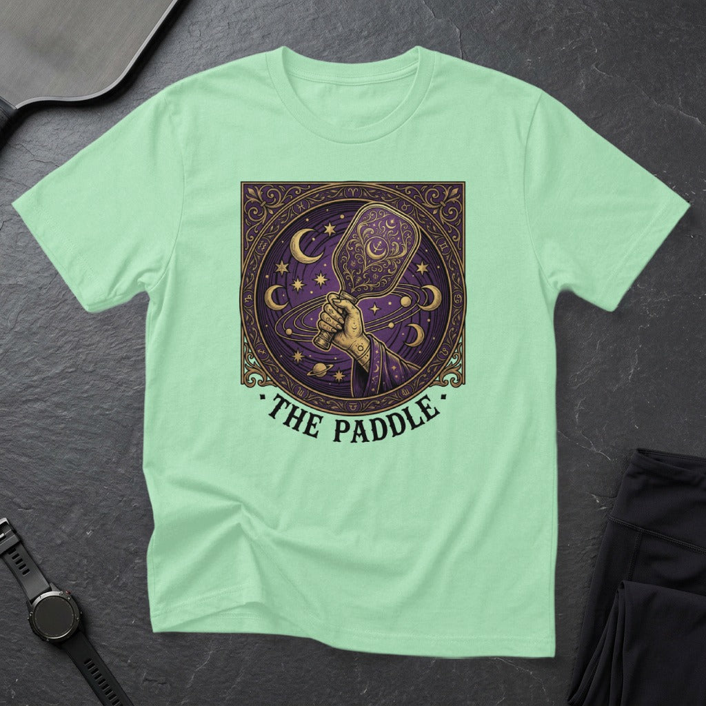 Mint green t-shirt with "The Paddle" celestial pickleball design.