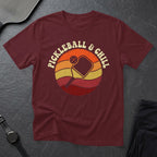Maroon t-shirt with "Pickleball & Chill" text and pickleball graphic.