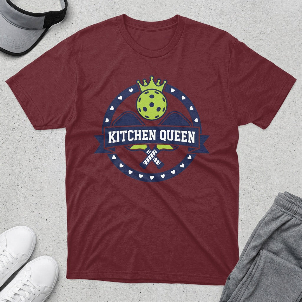 Maroon t-shirt with "Kitchen Queen" text, pickleball graphic, and crossed paddles.