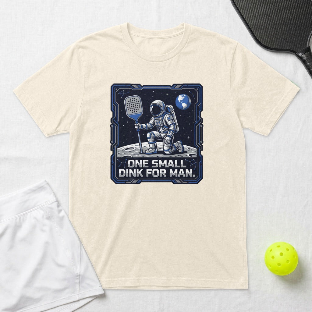 Astronaut on moon holding pickleball paddle with text "ONE SMALL DINK FOR MAN".