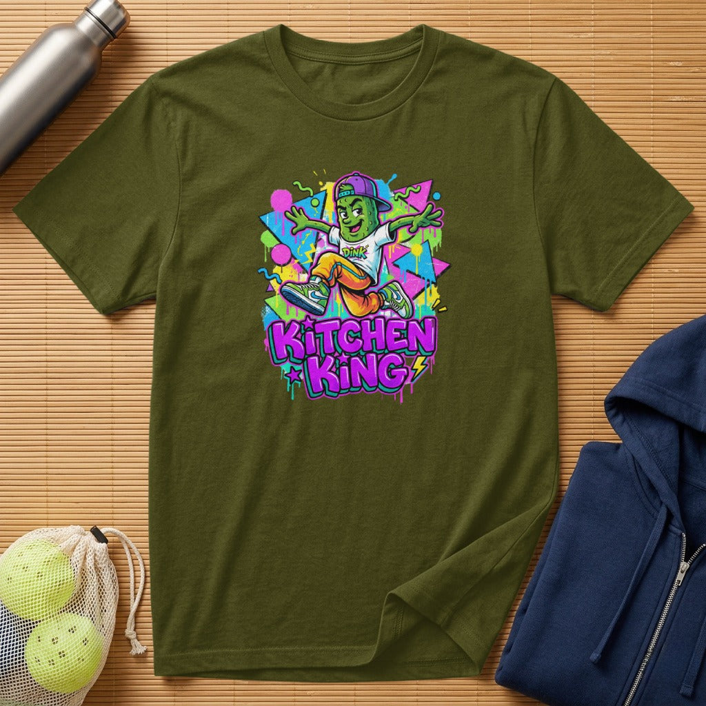 Green t-shirt featuring a cartoon character and "Kitchen King" text.